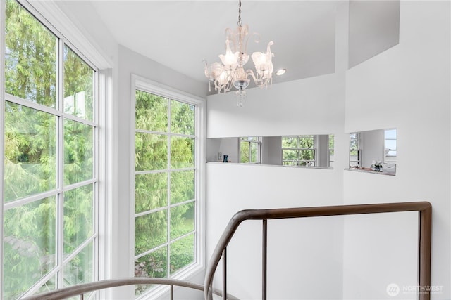 2053 Minor Ave E Unit 12, Seattle, WA 98102 - staircase featuring a chandelier