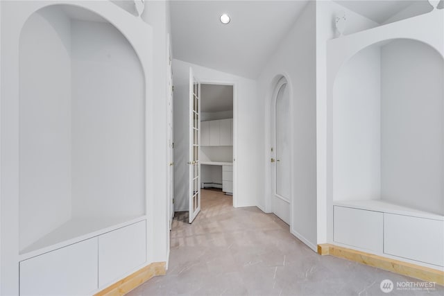 2053 Minor Ave E Unit 12, Seattle, WA 98102 - hall featuring vaulted ceiling, recessed lighting, and concrete flooring