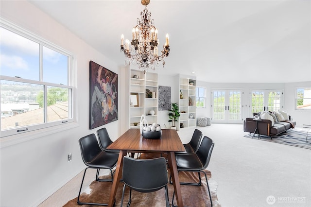 2053 Minor Ave E Unit 12, Seattle, WA 98102 - carpeted dining space with a chandelier and baseboards