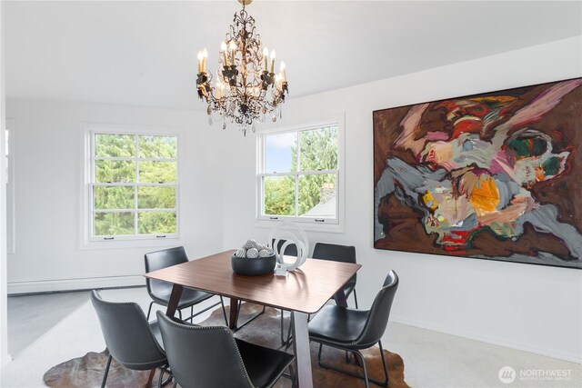 2053 Minor Ave E Unit 12, Seattle, WA 98102 - dining room with a baseboard radiator and a chandelier