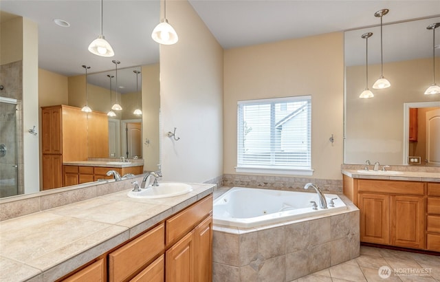 17713 92nd Ave E, Puyallup, WA 98375 - full bathroom featuring a stall shower, two vanities, a jetted tub, and tile patterned flooring