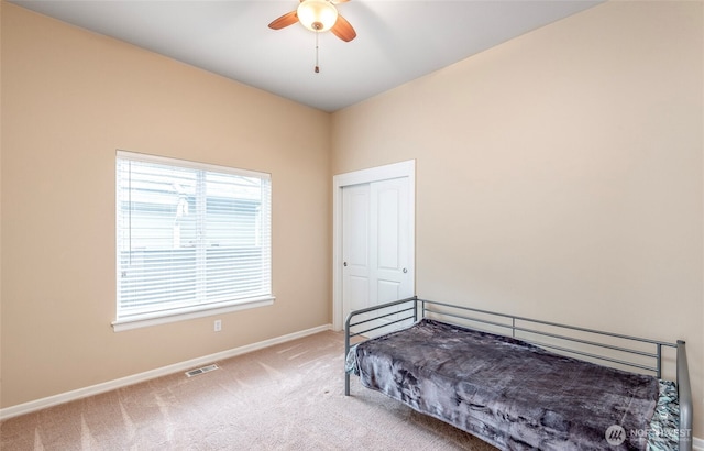 17713 92nd Ave E, Puyallup, WA 98375 - bedroom with carpet floors, a closet, and a ceiling fan