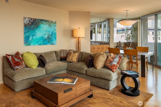 2000 1st Ave Unit 804, Seattle, WA 98121 - living room featuring wood finished floors