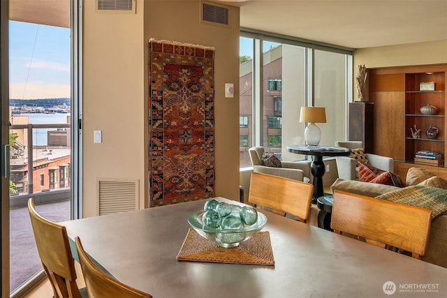 2000 1st Ave Unit 804, Seattle, WA 98121 - dining room featuring a wall of windows