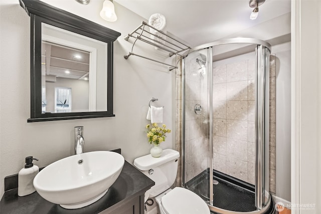 28440 Sound View Dr S, Des Moines, WA 98198 - full bathroom featuring a stall shower, vanity, and toilet