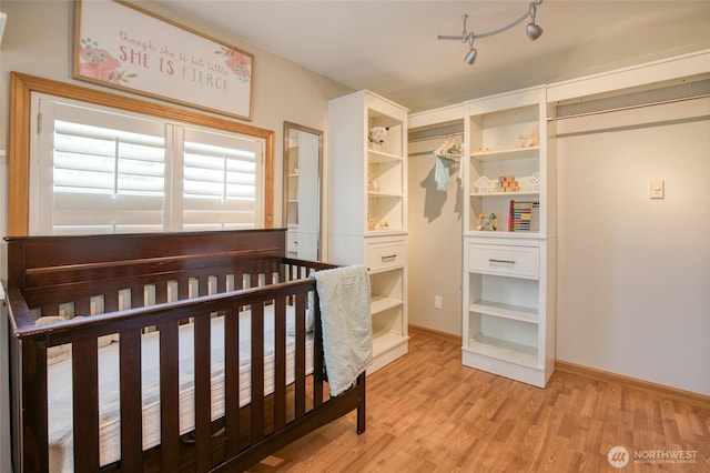 2685 E Hoquiam Rd, Hoquiam, WA 98550 - unfurnished bedroom with light wood-style floors and baseboards