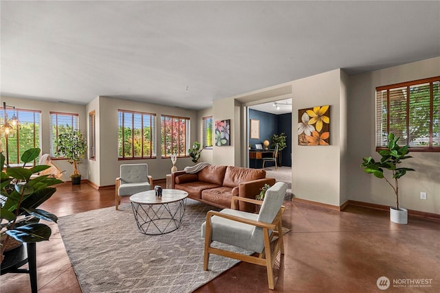3651 School St, Wenatchee, WA 98801 - living area with baseboards and a chandelier