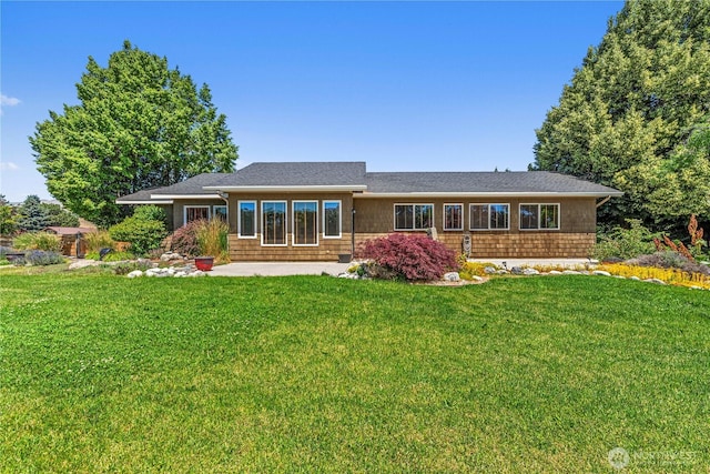 3651 School St, Wenatchee, WA 98801 - rear view of property featuring a yard and a patio area