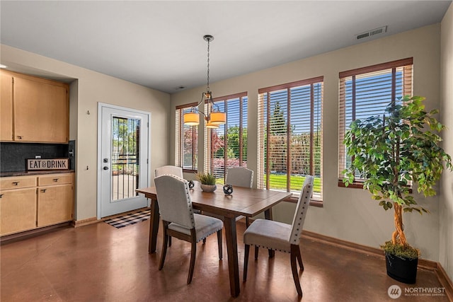 3651 School St, Wenatchee, WA 98801 - dining room featuring baseboards and concrete floors