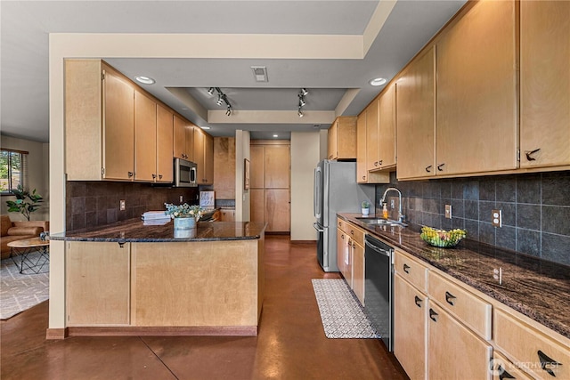 3651 School St, Wenatchee, WA 98801 - kitchen with appliances with stainless steel finishes, a sink, finished concrete floors, backsplash, and a peninsula