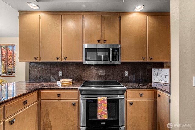 3651 School St, Wenatchee, WA 98801 - kitchen featuring stainless steel appliances, decorative backsplash, dark stone countertops, and recessed lighting