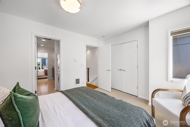 203 20th Ave E, Seattle, WA 98112 - bedroom with a closet and baseboards