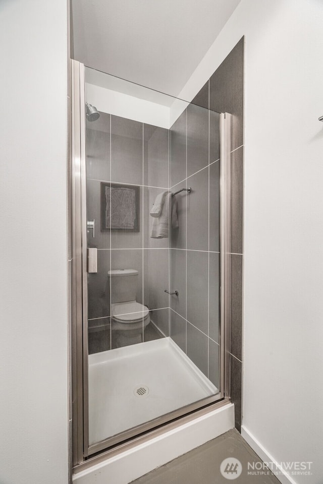 203 20th Ave E, Seattle, WA 98112 - bathroom featuring a shower stall and toilet