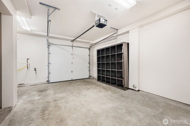 203 20th Ave E, Seattle, WA 98112 - garage featuring a garage door opener
