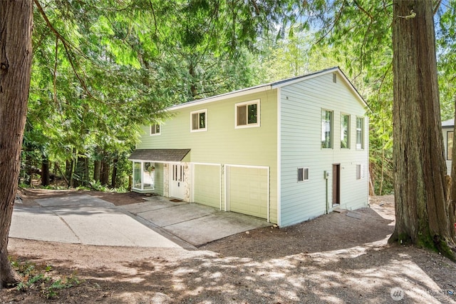 415 Sudden Valley Dr, Bellingham, WA 98229 - view of front of house with driveway and an attached garage