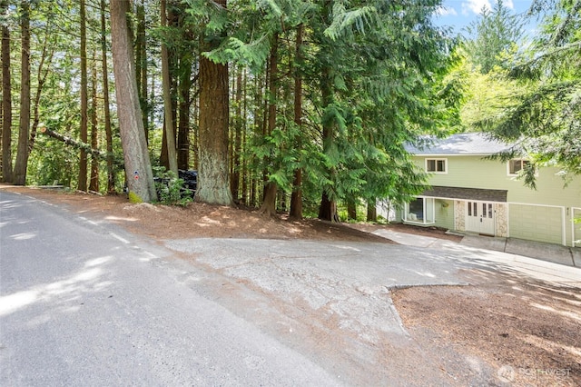 415 Sudden Valley Dr, Bellingham, WA 98229 - view of yard featuring driveway and an attached garage