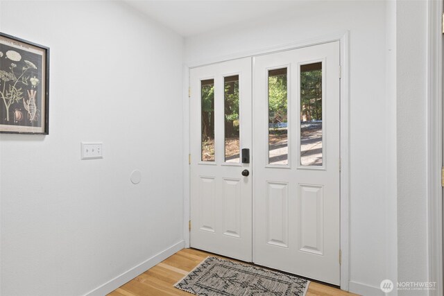 415 Sudden Valley Dr, Bellingham, WA 98229 - doorway with light wood-type flooring and baseboards
