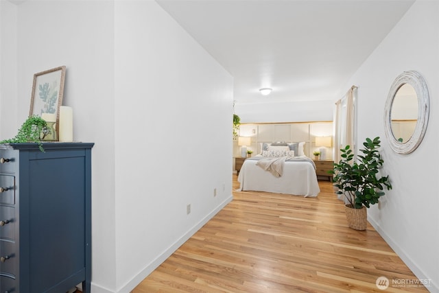 415 Sudden Valley Dr, Bellingham, WA 98229 - bedroom featuring light wood-style flooring and baseboards