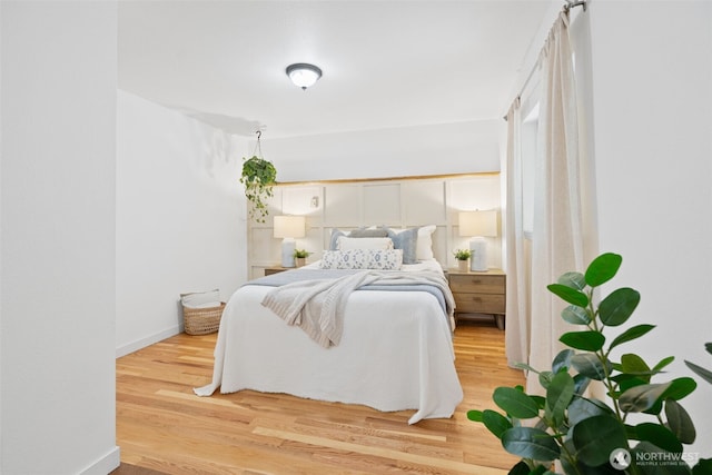 415 Sudden Valley Dr, Bellingham, WA 98229 - bedroom featuring wood finished floors and baseboards