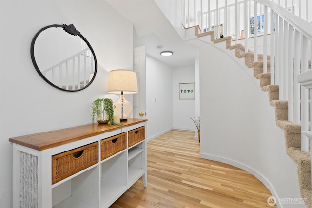 415 Sudden Valley Dr, Bellingham, WA 98229 - hall featuring light wood-type flooring, stairs, and baseboards