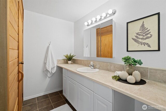 415 Sudden Valley Dr, Bellingham, WA 98229 - bathroom with vanity, tile patterned floors, and baseboards
