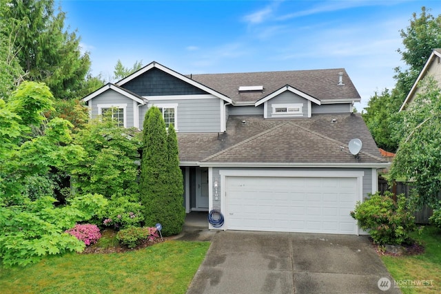 4109 Shale St SE, Lacey, WA 98503 - view of front of house with a shingled roof, driveway, and an attached garage