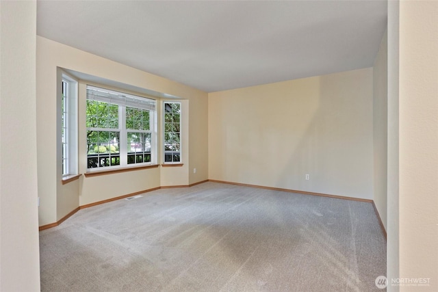 4109 Shale St SE, Lacey, WA 98503 - spare room with carpet floors and baseboards
