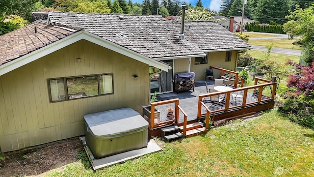 209 Old Hill Rd, Aberdeen, WA 98520 - back of house with a hot tub, a lawn, and a deck