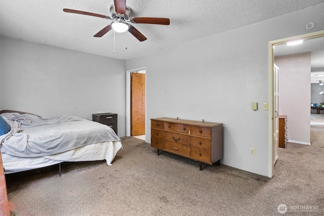 209 Old Hill Rd, Aberdeen, WA 98520 - carpeted bedroom featuring a textured ceiling and a ceiling fan
