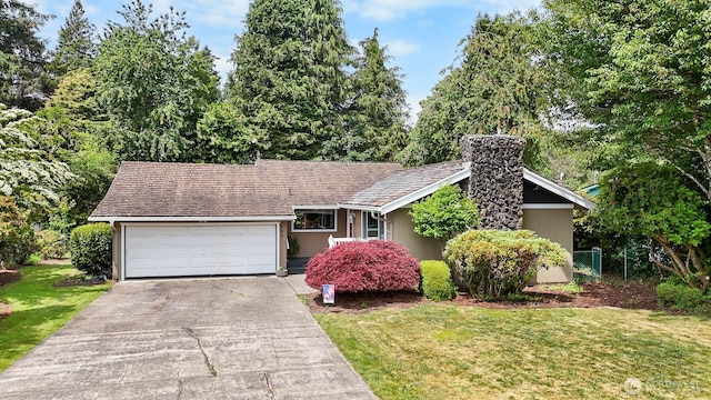 209 Old Hill Rd, Aberdeen, WA 98520 - view of front of house featuring an attached garage, driveway, and a chimney