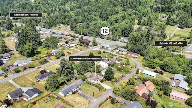 209 Old Hill Rd, Aberdeen, WA 98520 - aerial view of property and surrounding area with nearby suburban area