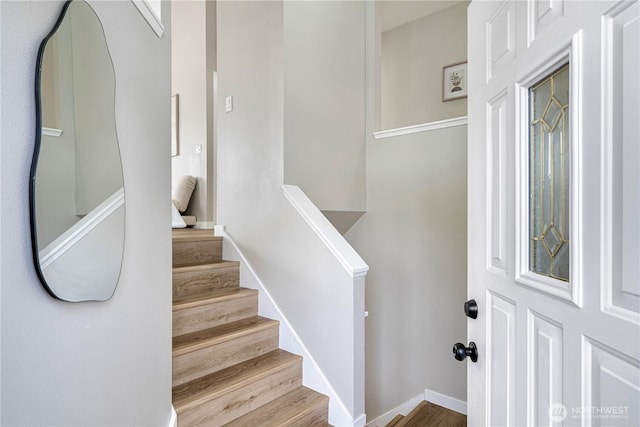 9422 49th Ave S, Seattle, WA 98118 - stairway featuring wood finished floors and baseboards