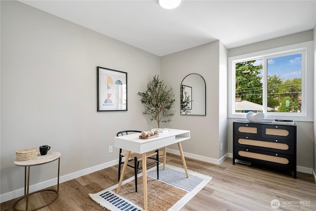 9422 49th Ave S, Seattle, WA 98118 - home office featuring light wood finished floors and baseboards