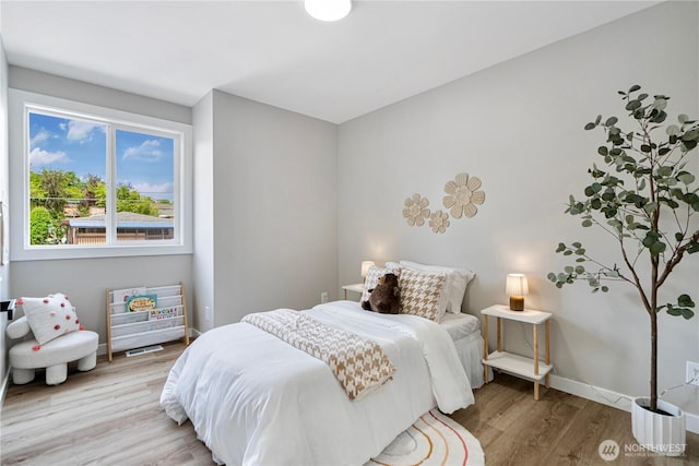 9422 49th Ave S, Seattle, WA 98118 - bedroom with wood finished floors and baseboards
