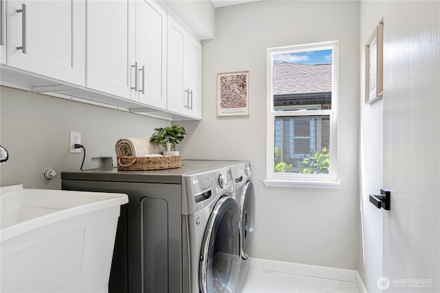 9422 49th Ave S, Seattle, WA 98118 - washroom with washing machine and dryer and cabinet space