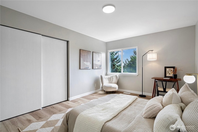 9422 49th Ave S, Seattle, WA 98118 - bedroom featuring wood finished floors and a closet