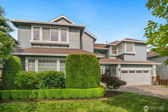 27638 246th Ave SE, Maple Valley, WA 98038 - traditional-style home featuring concrete driveway, a garage, and a shingled roof