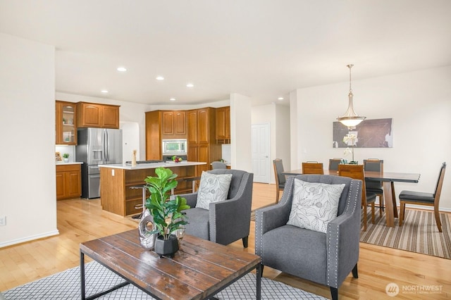 27638 246th Ave SE, Maple Valley, WA 98038 - living area featuring light wood finished floors and recessed lighting