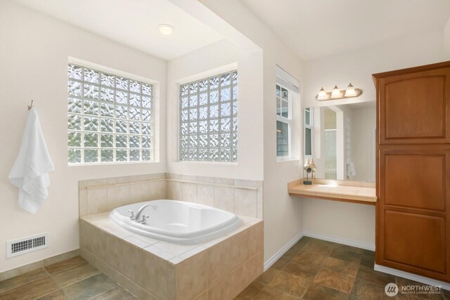 27638 246th Ave SE, Maple Valley, WA 98038 - bathroom with a garden tub and baseboards