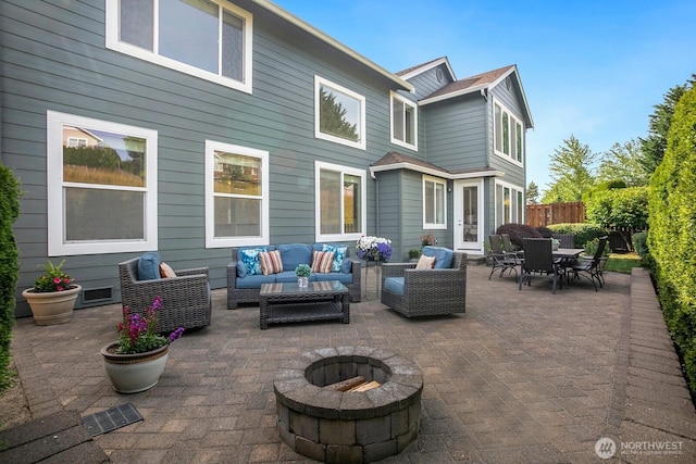 27638 246th Ave SE, Maple Valley, WA 98038 - view of patio / terrace featuring an outdoor living space with a fire pit