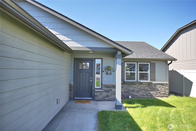 1028 W Sequoia Rd, Moses Lake, WA 98837 - property entrance with stone siding and roof with shingles