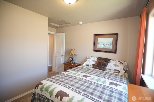1028 W Sequoia Rd, Moses Lake, WA 98837 - carpeted bedroom featuring baseboards and attic access