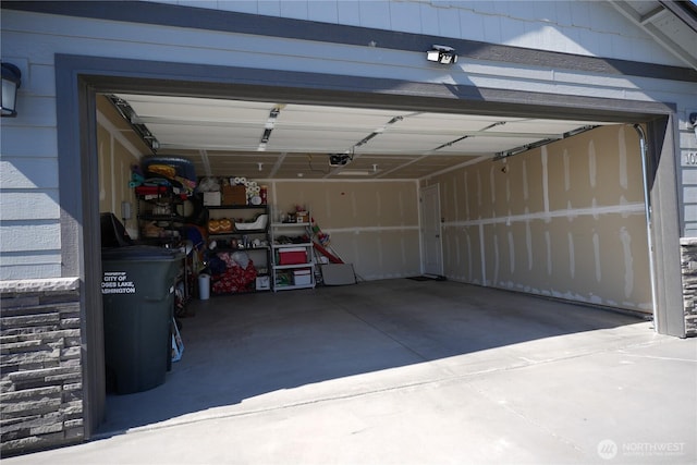 1028 W Sequoia Rd, Moses Lake, WA 98837 - garage with a garage door opener