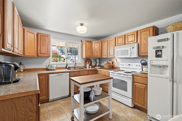 2112 SE Yucca Ct, Port Orchard, WA 98366 - kitchen featuring white appliances, a sink, light tile patterned floors, and tile counters