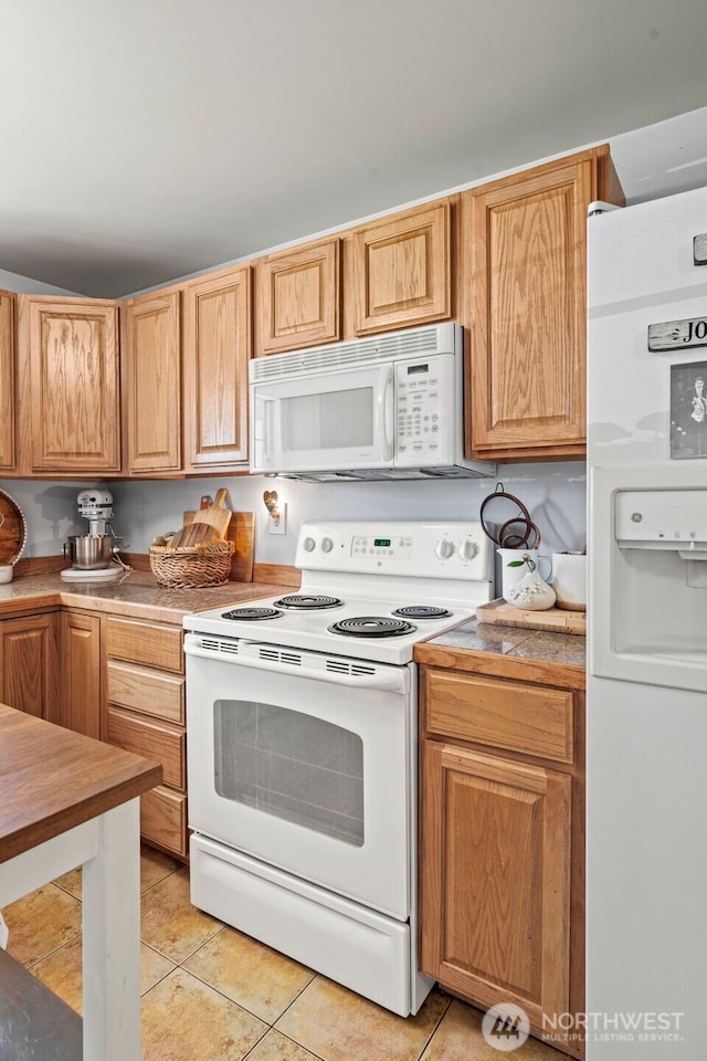 2112 SE Yucca Ct, Port Orchard, WA 98366 - kitchen with white appliances, light tile patterned floors, and light countertops