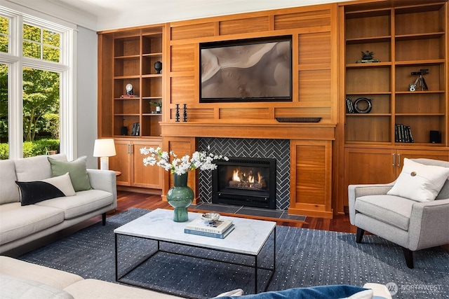 8418SE 44th St, Mercer Island, WA 98040 - living area with dark wood-type flooring, a fireplace, and built in shelves