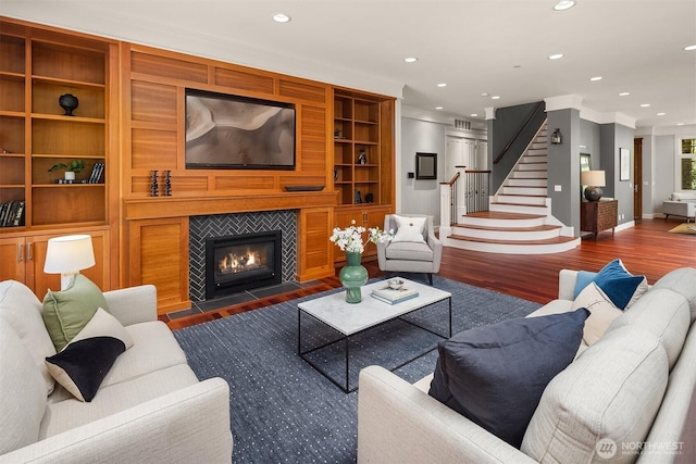 8418SE 44th St, Mercer Island, WA 98040 - living area featuring wood finished floors, baseboards, recessed lighting, crown molding, and a tiled fireplace