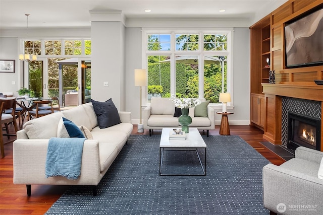 8418SE 44th St, Mercer Island, WA 98040 - living area featuring dark wood-type flooring, a chandelier, a tile fireplace, baseboards, and recessed lighting