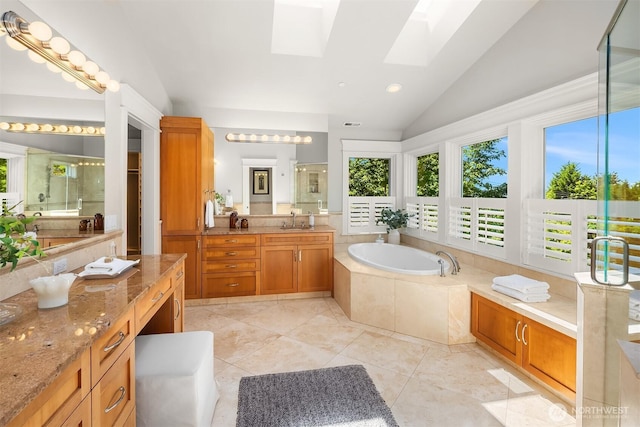 8418SE 44th St, Mercer Island, WA 98040 - bathroom with lofted ceiling, a stall shower, a bath, a skylight, and vanity