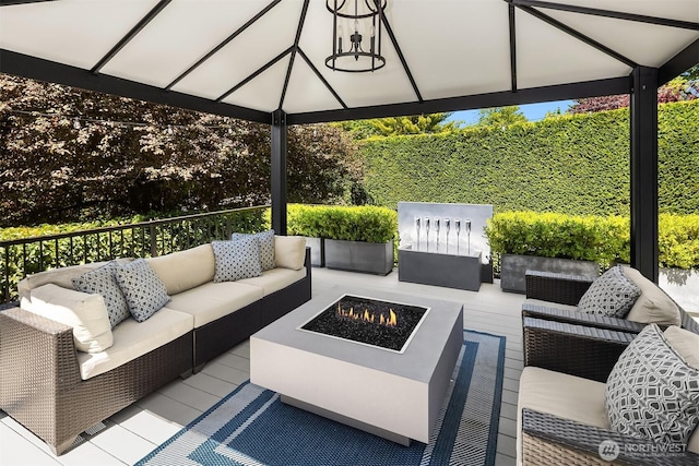8418SE 44th St, Mercer Island, WA 98040 - view of patio / terrace with an outdoor living space with a fire pit and a gazebo